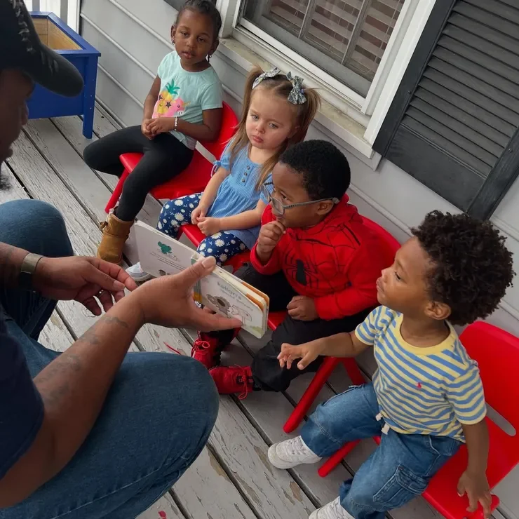 Children listening during outdoor story time